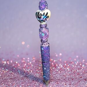 Purple Beaded Pen with Heart Accent that says “I Love You”